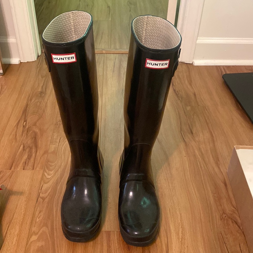 Black shiny tall hunter boots